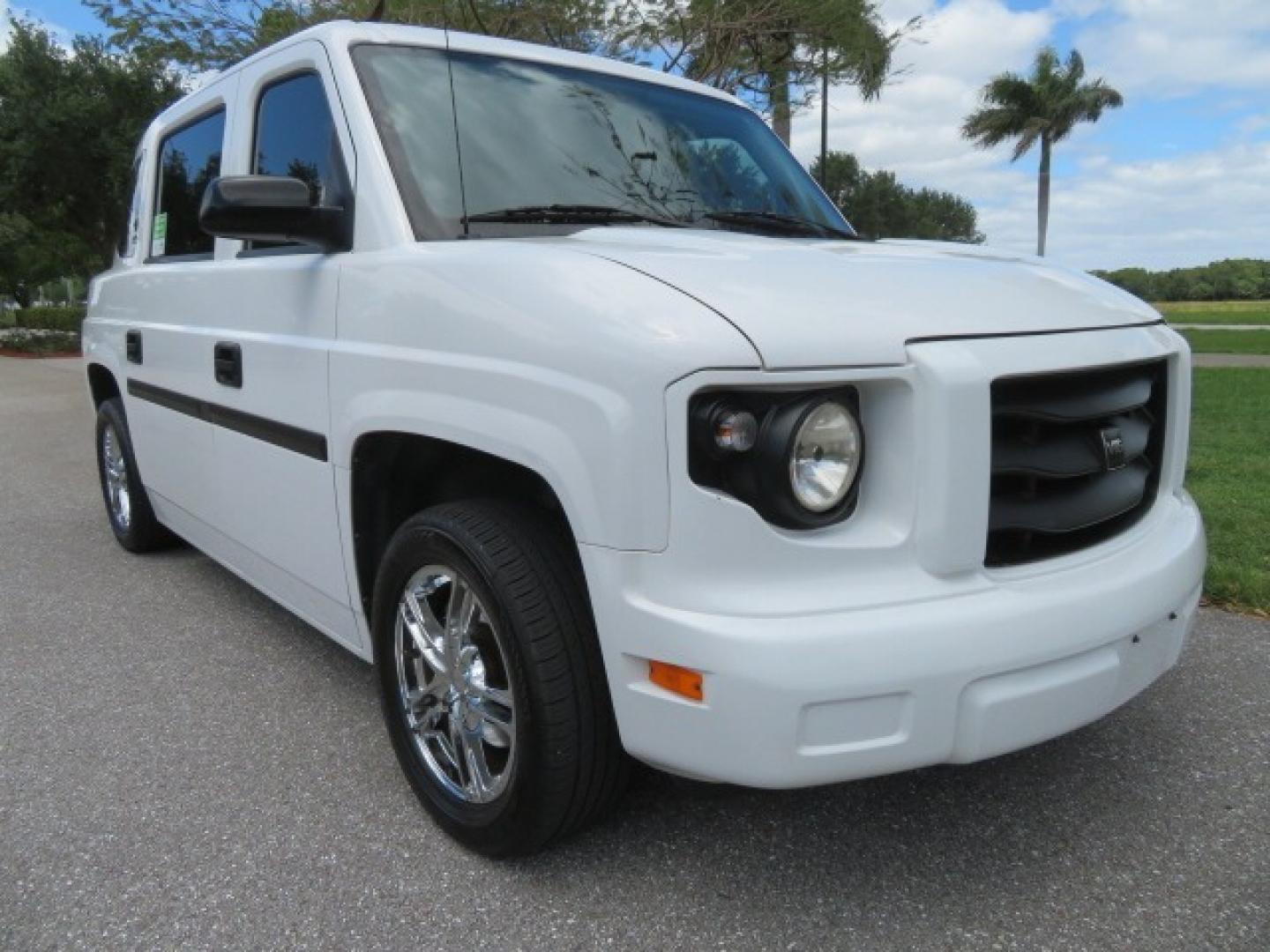 2012 White /Black with an 4.6L V8 engine, Automatic transmission, located at 4301 Oak Circle #19, Boca Raton, FL, 33431, (954) 561-2499, 26.388861, -80.084038 - You are looking at a Gorgeous 2012 Mobility Ventures MV1 Handicap Wheelchair Conversion Van with 64K Original Miles, 4.6L Ford V8, Bleack Leather Type Interior, Alloy Wheels, Power Side Entry Wheelchair Lift with Long Ramp and Short Ramp Function, Q Lock 150 EZ Lock, L-Track Tie Down System, Back Up - Photo#9